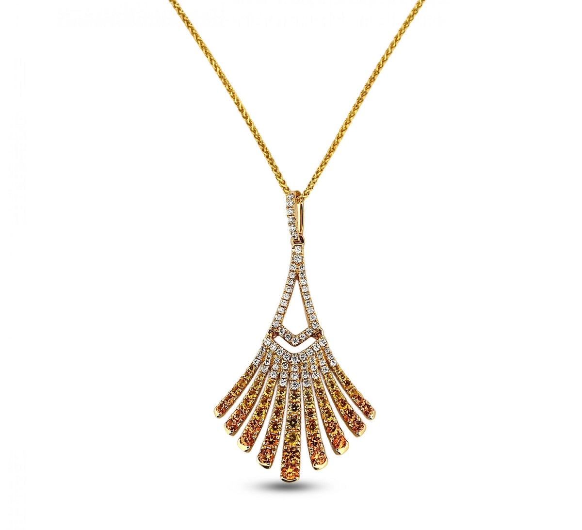 Gold necklace with a fan-shaped pendant on a white background