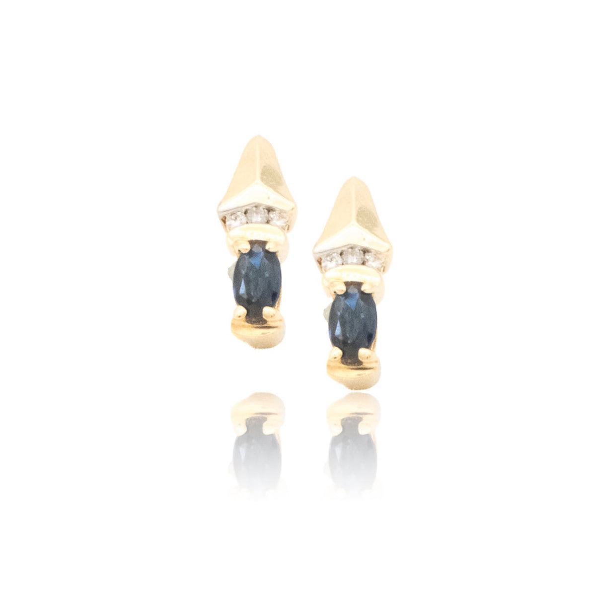 Gold earrings with blue gemstones on a white background