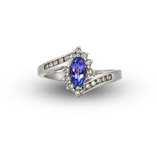 Silver ring with a blue gemstone and diamond accents on a white background