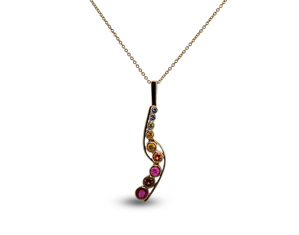 Necklace with a curved pendant featuring multicolored gemstones on a white background
