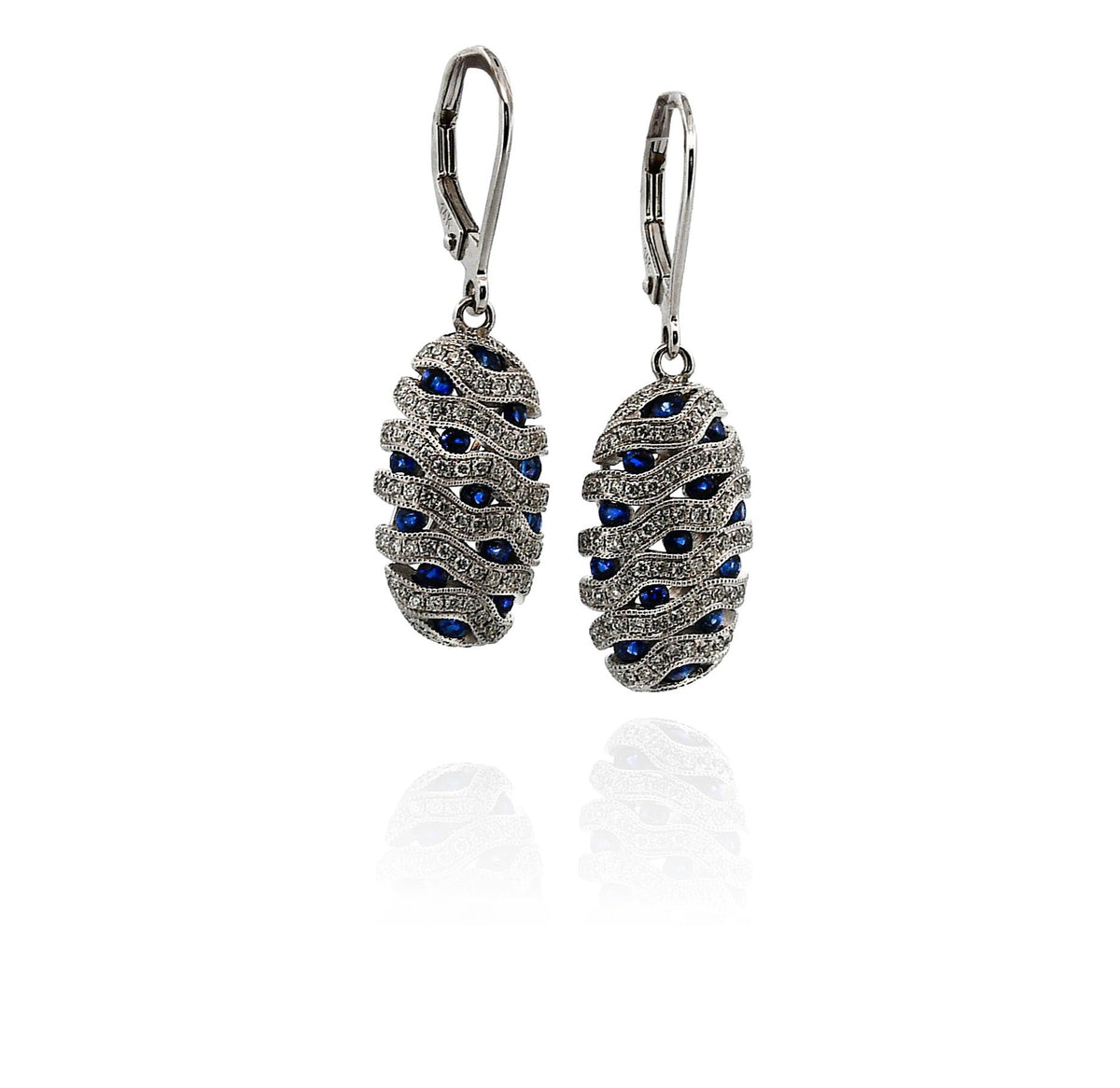 Pair of silver earrings with blue gemstones on a white background