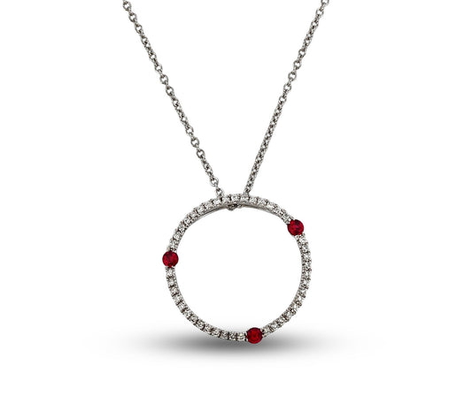 Necklace with a circular pendant featuring red stones on a white background