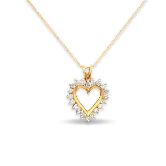 Gold heart-shaped pendant necklace on a white background