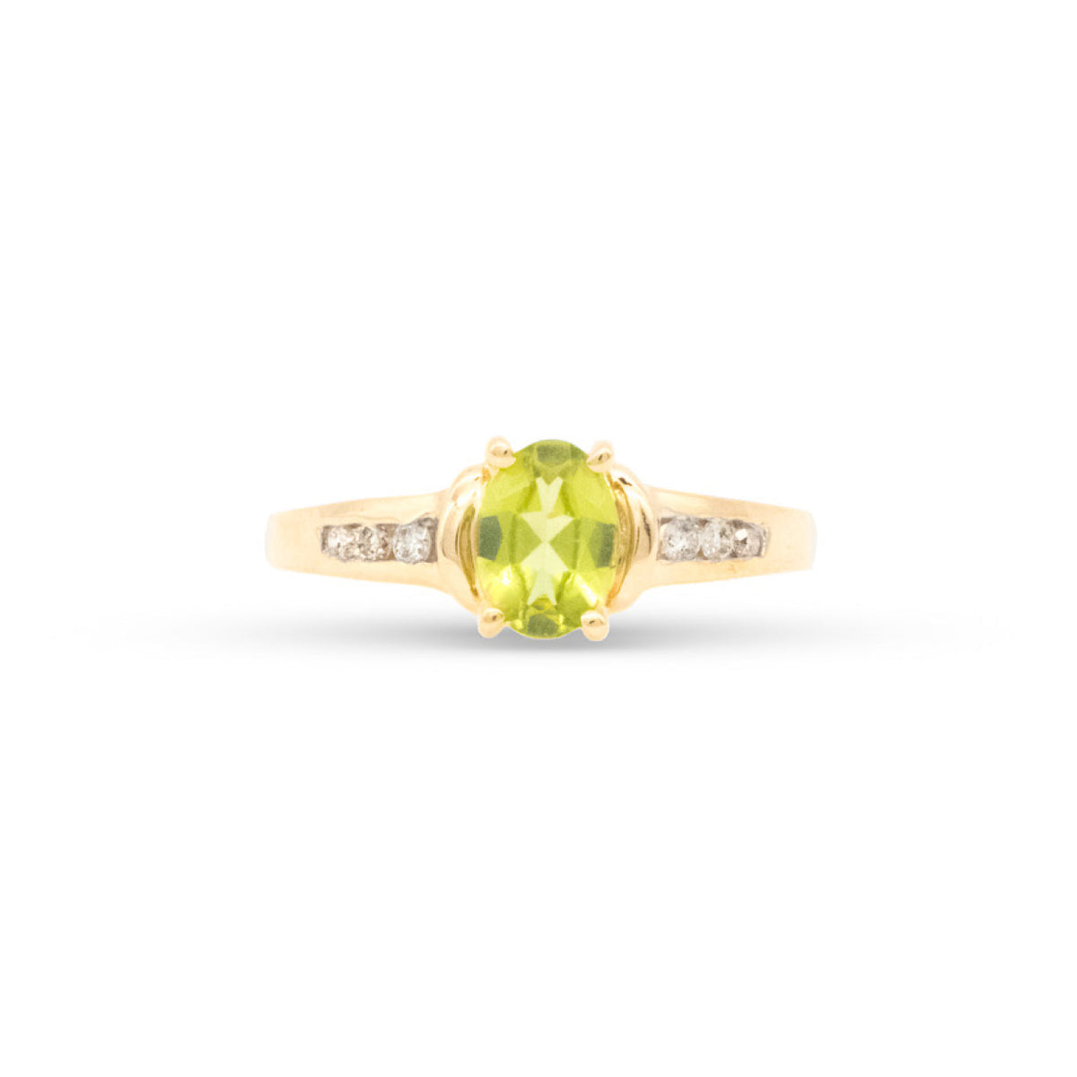 Gold ring with a green gemstone and small diamonds on a white background