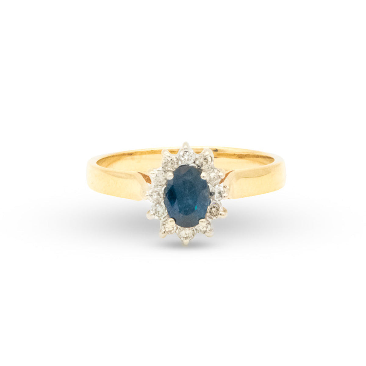 Gold ring with a blue gemstone and diamond accents on a white background